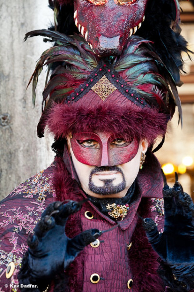 Person in Venetian costume during Venice Carnival